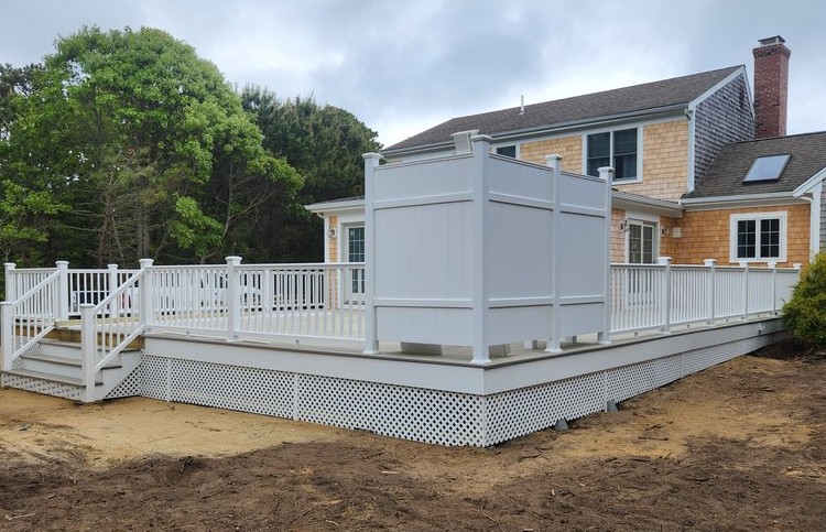 Completed deck with outdoor shower and trim
